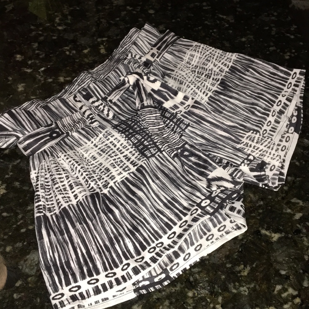 Sz 2 shorts by “Bebe”